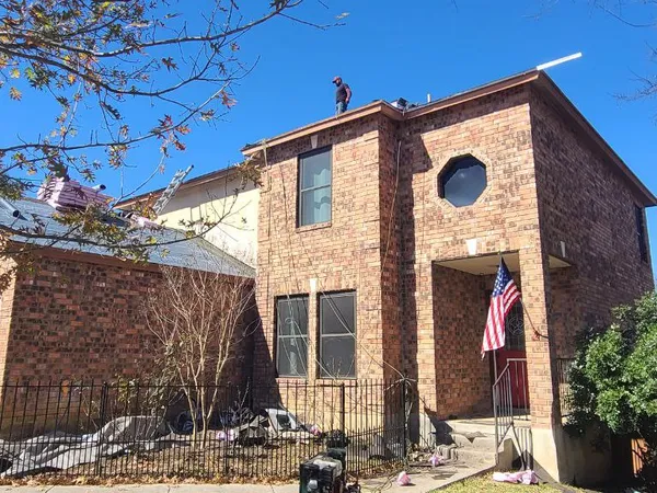 Two-story brick home re-roof