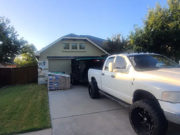 Materials staged on the driveway