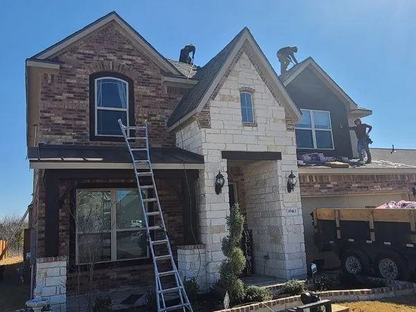 Two-story brick home re-roof
